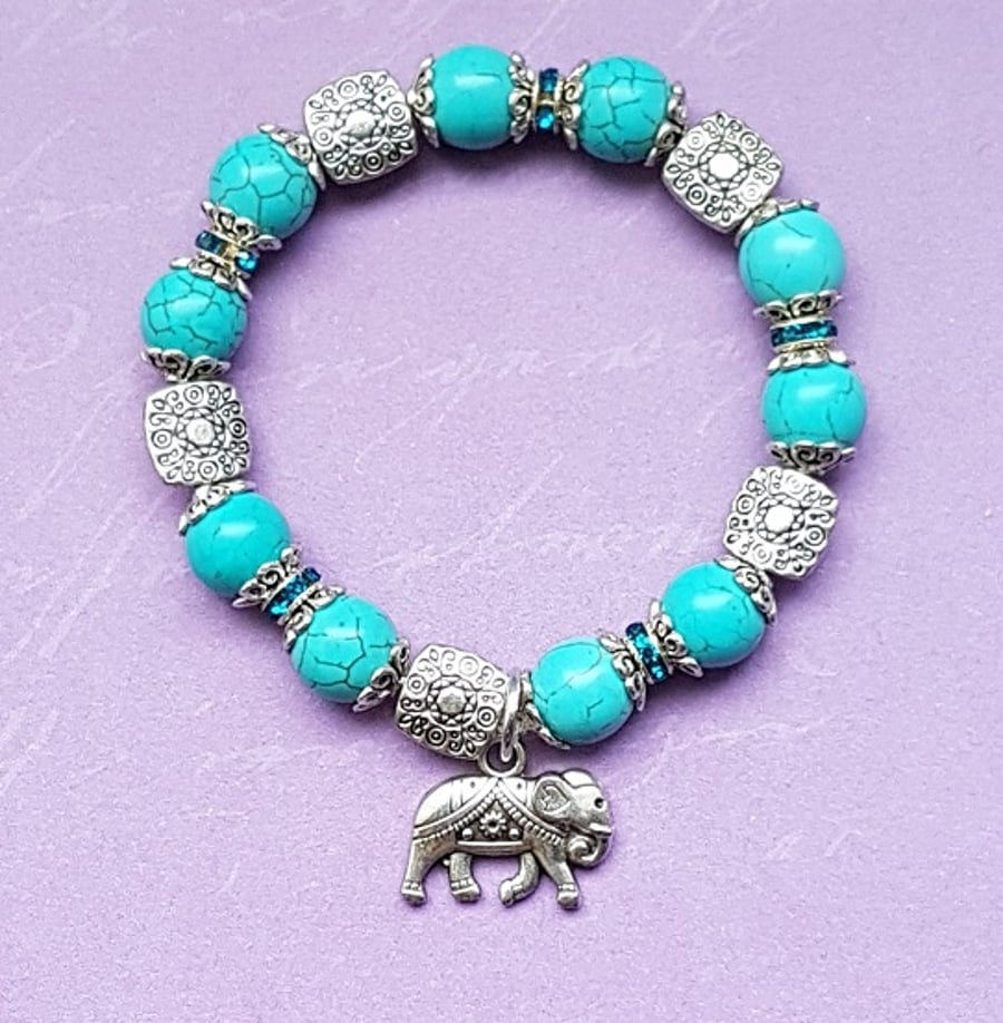 Beautiful Turquoise and fancy bead stretch bracelet with Elephant charm
