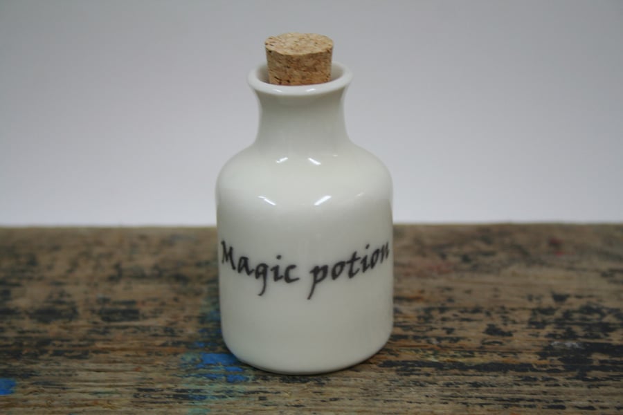 Small porcelain bottle with magic potion wording