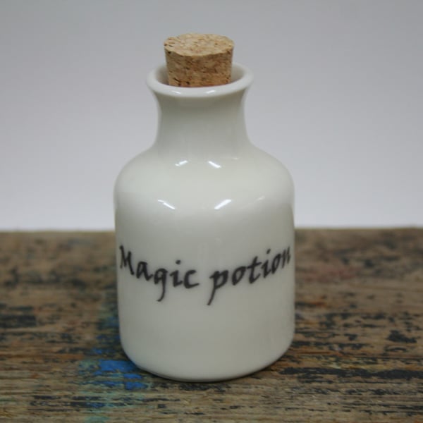 Small porcelain bottle with magic potion wording