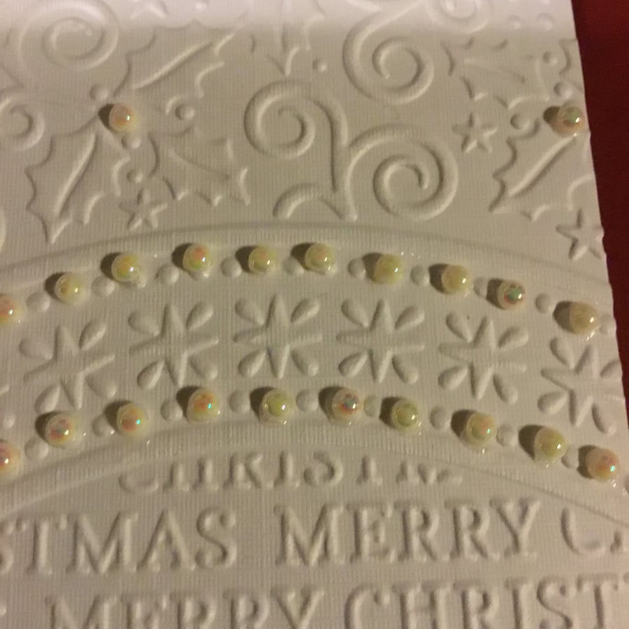 A beautifully embossed Christmas Card CC081