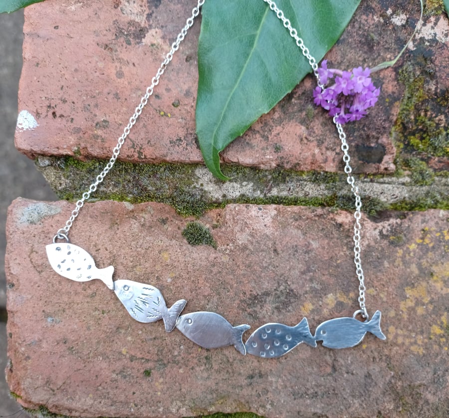 A shoal lot of fish necklace