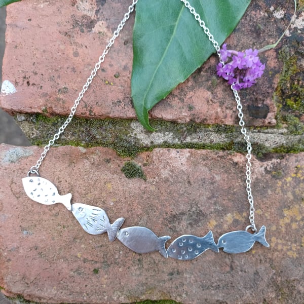 A shoal lot of fish necklace