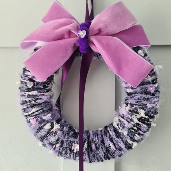 Lilac yarn wrapped wreath with velvet bow