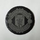 Man Utd logo on a slate coaster 