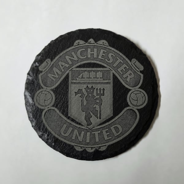 Man Utd logo on a slate coaster 