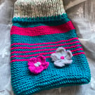 Hand knitted cosy hot water bottle cover