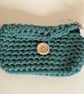 Handmade crochet purse made with green t-shirt yarn 