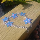 Pink and White Daisies on a Blue Flower Chain Bracelet