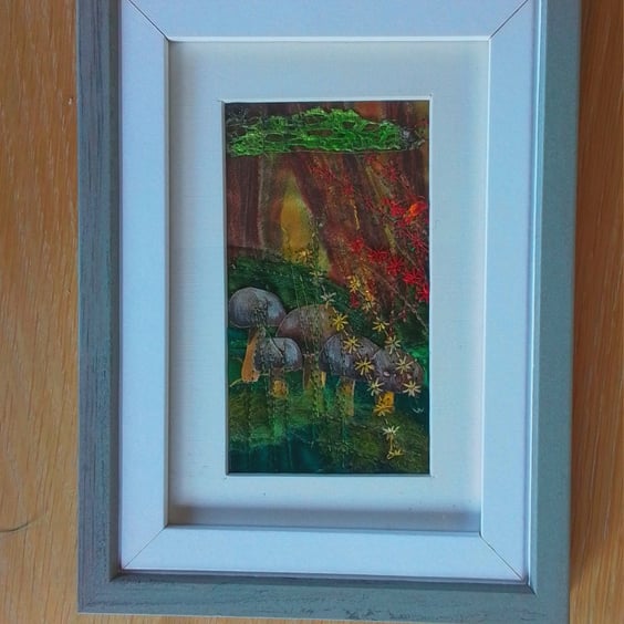 Woodland themed framed textile picture. 