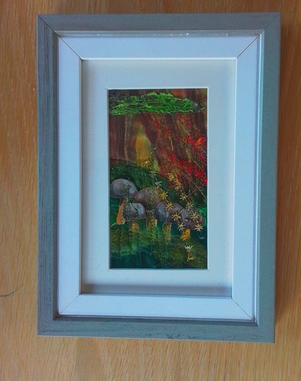Woodland themed framed textile picture. 