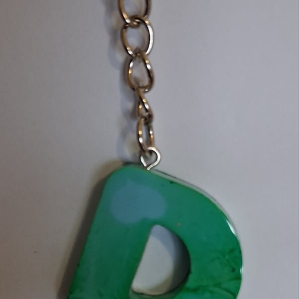 Handmade epoxy resin keyring with initial letter D
