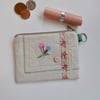 Coin purse in reclaimed embroidered cloth with roses ribbon