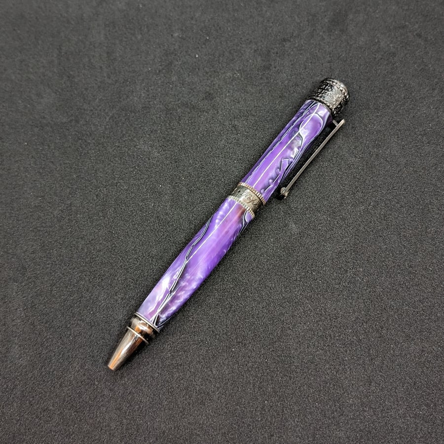 Hand turned, Antique Bronze Pen with a purple, white and black acrylic body 
