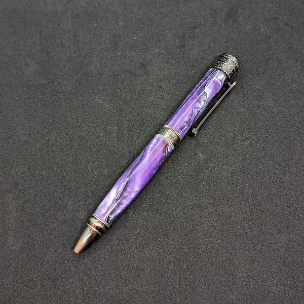 Hand turned, Antique Bronze Pen with a purple, white and black acrylic body 