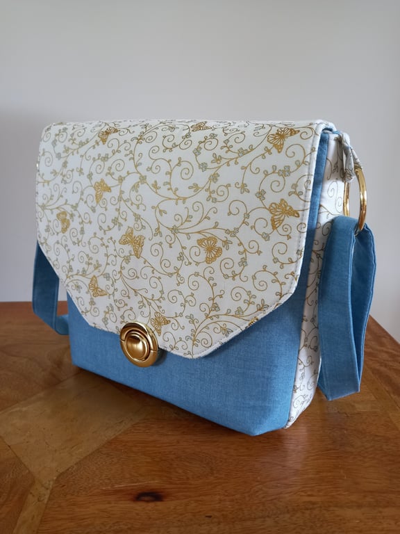 Blue and cream metallic butterfly print bag