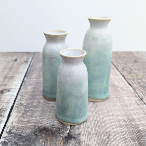Trio of small ceramic vases, white and turquoise glaze