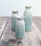 Trio of small ceramic vases, white and turquoise glaze