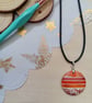 Orange patterned hand painted wooden necklace 