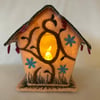 Little felt fabric embroidered tea light bird house. 