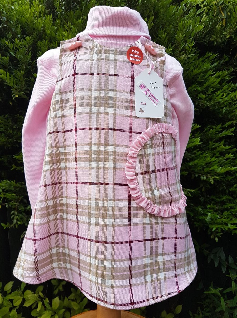 Age: 2-3y. Pink check tartan lined pinafore dress. 