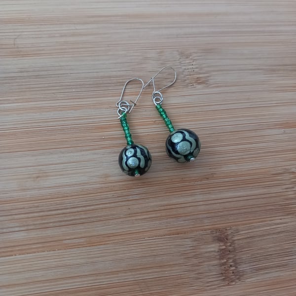 Green and black beaded earrings for pierced ears