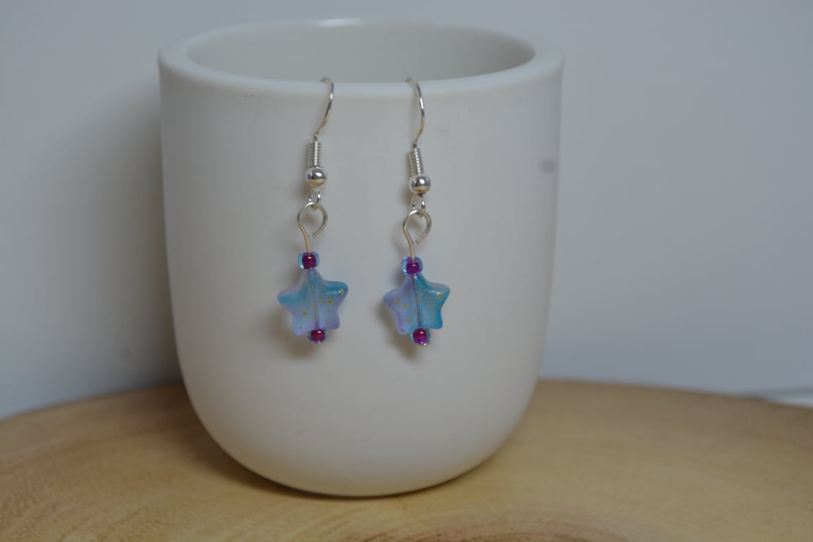 Blue and Purple glass beaded star earrings with gold shimmer 