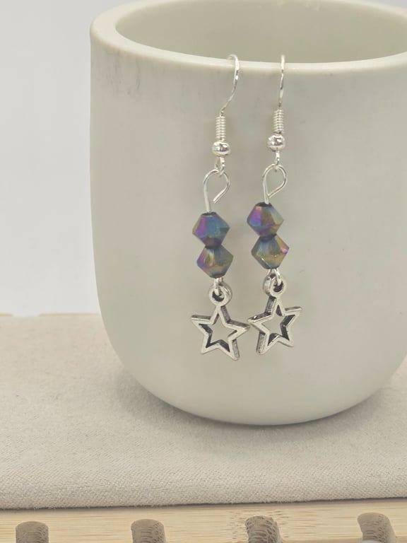 Silver star charm earrings with multi coloured faceted glass beads.