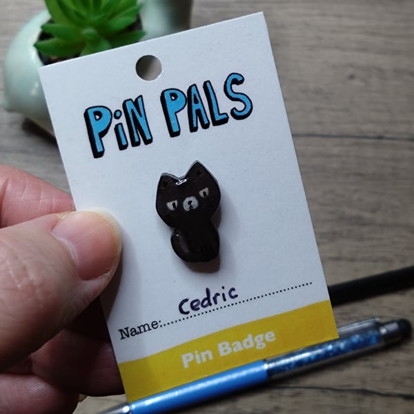 Cedric cat pin badge