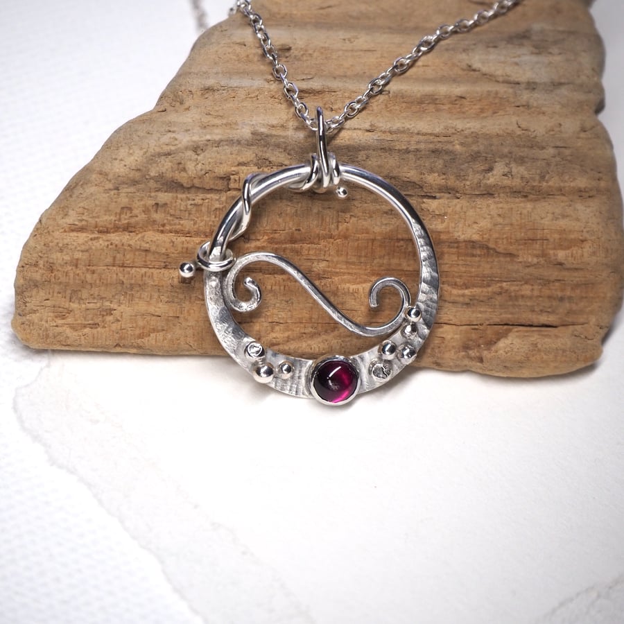 Silver pendant, dark red garnet, spirals and pebbles, hallmarked pendant