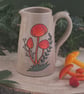 Hand painted ceramic jug
