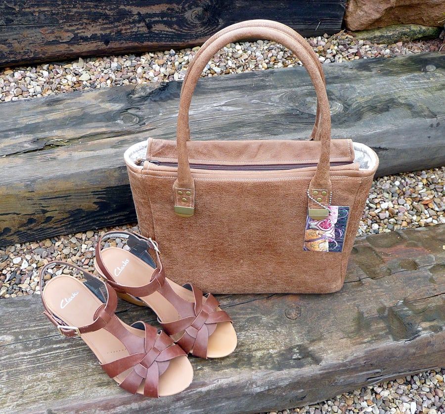 Leather handbag with zip top closure, light brown leather handbag