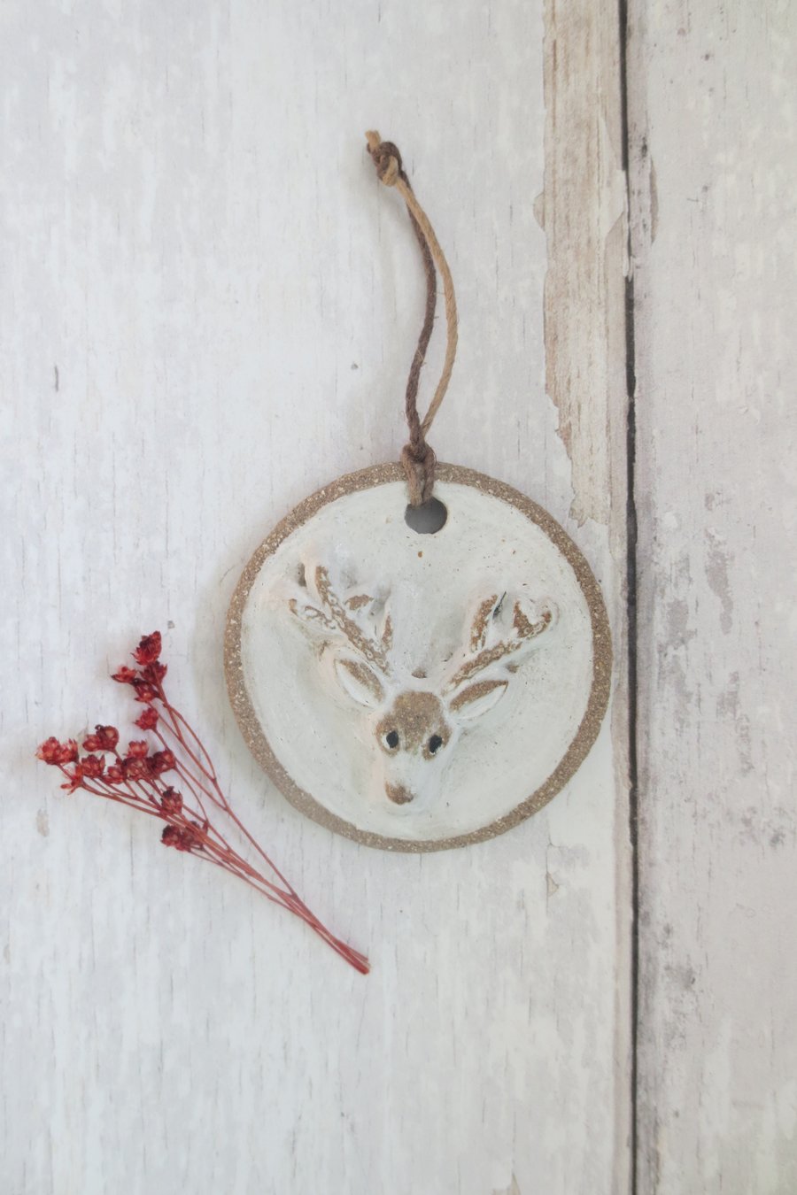 WALL DECORATION hand-built stoneware stag's head ornament in white