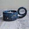 Very dark blue ceramic tealight holder with gold stars