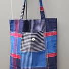 Navy stripped fold up tote bag.
