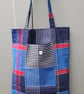 Navy stripped fold up tote bag.