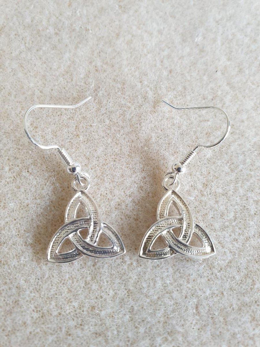 Handmade silver plated earrings with beautiful silver plated celtic knot charm 