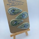 Green blue peacock feather handmade ceramic buttons. Embossed design, handpainte