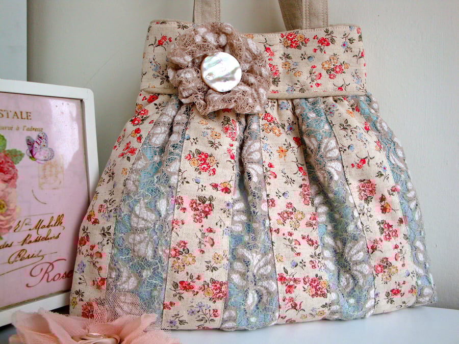 Lace and linen patchwork Quilted Handbag .