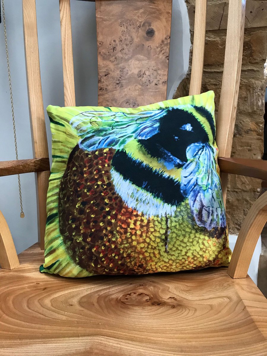 Luxury cushion featuring Bee Happy by artist Janet Bird