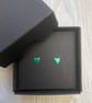 Green enamel heart studs. Sterling silver studs.