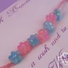 Purple Jute Wish Bracelet with Flower Beads