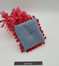 Pin cushion in denim with red bobble trim.  - Image 7