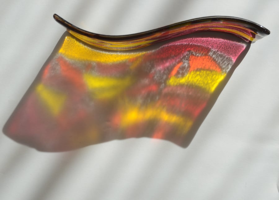 Red and yellow glass suncatcher wave