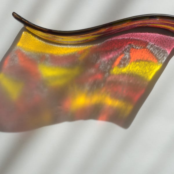Red and yellow glass suncatcher wave