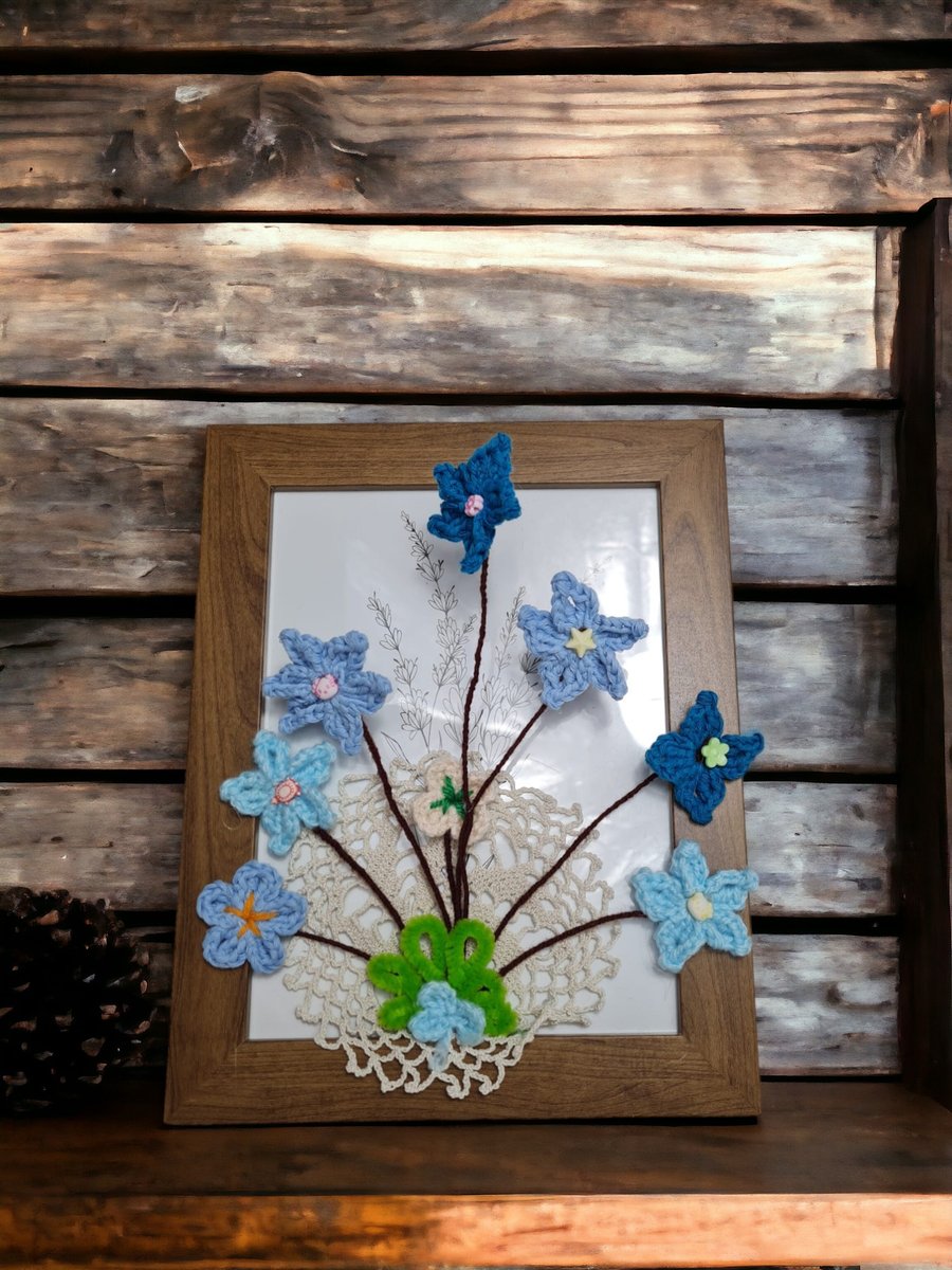 photo frame with crochet flowers and doily