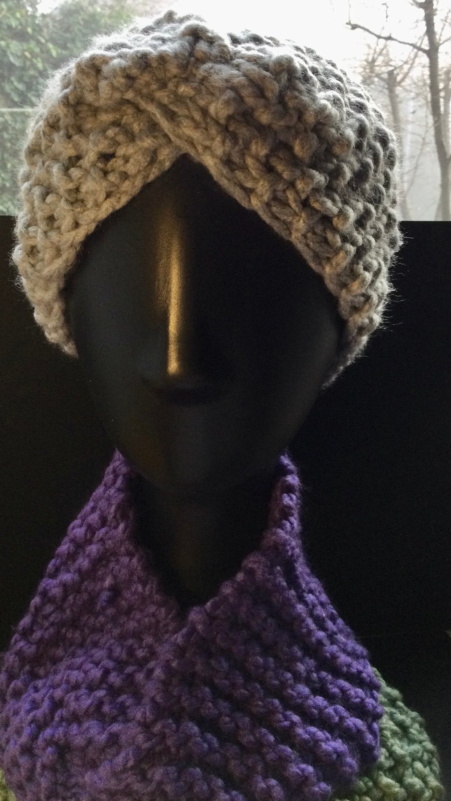 Grey.   Hand knitted head, ear or neck warmer.