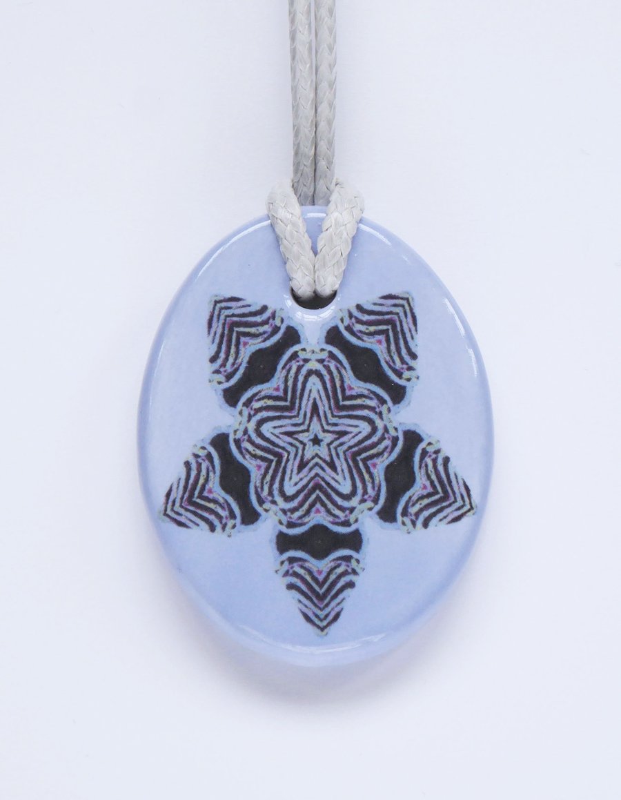 Mauve Stylised Flower Design Ceramic Pendant on Grey Cord with Lobster Clasp