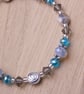 Opalite and blue bead bracelet with spirals - Image 3