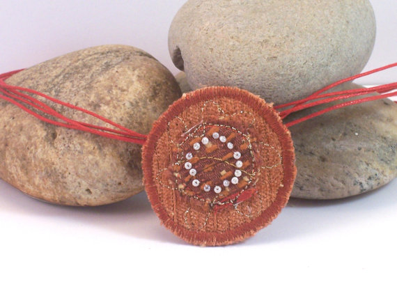 Fabric necklace inspired by our solar system