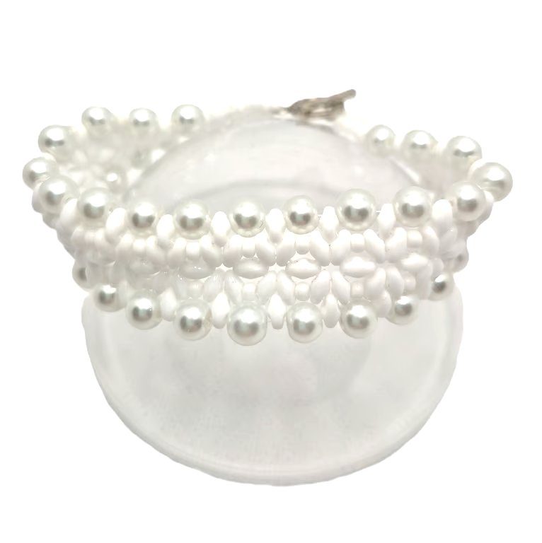 White beaded cuff bracelet with faux pearl edges perfect for a bride